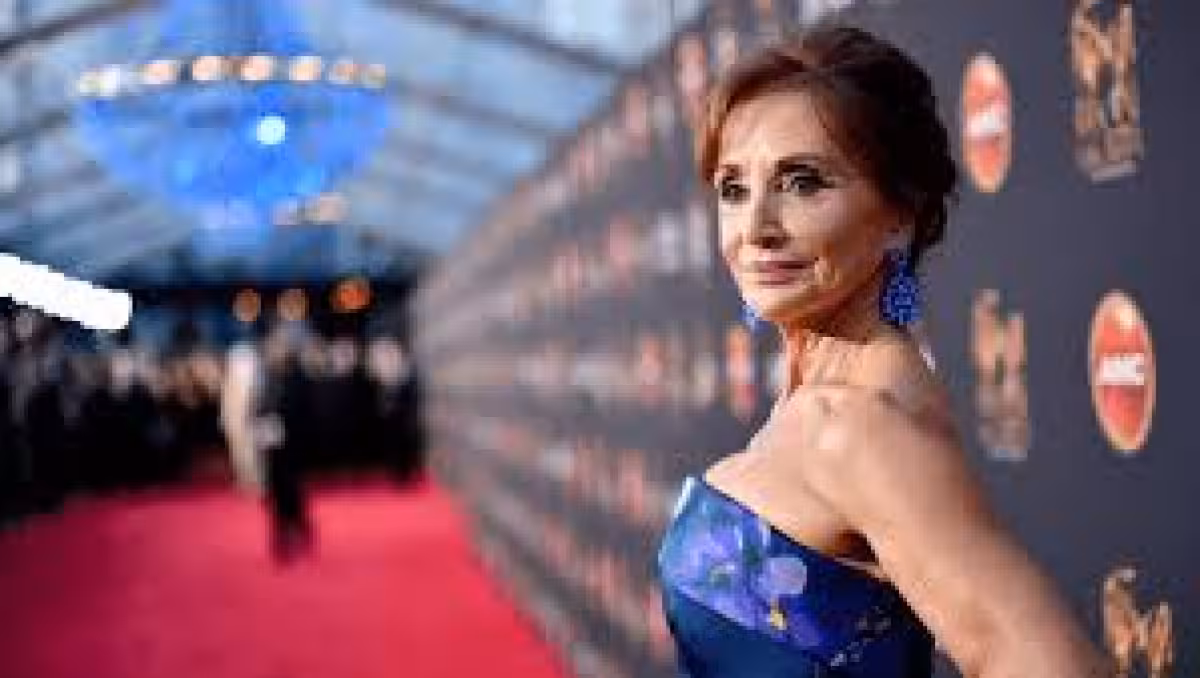 Susan Lucci turns heads at Outcome premiere in blue gown