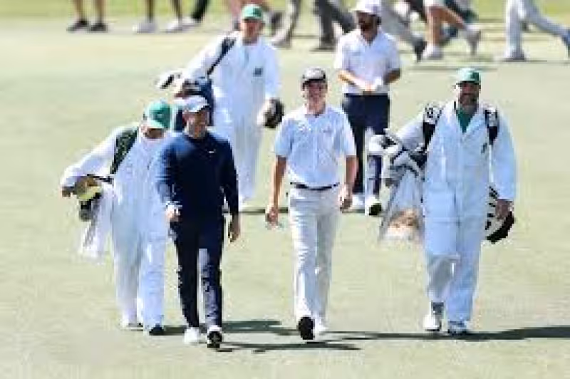 Now on the tee, playing with Rory McIlroy, a very nervous high schooler