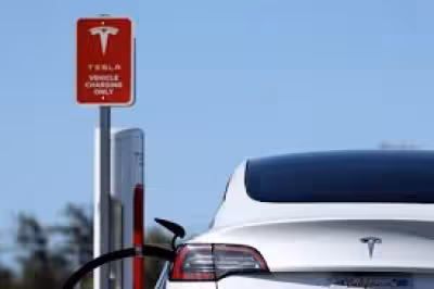 Tsla rises as UBS softens call on Tesla and lifts Ford, GM