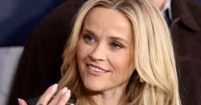 Reese Witherspoon says it’s time to learn AI, and authors push back