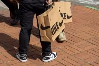 Tim Cook Buys Nike Shares as Elliott Hill Adds to Stake