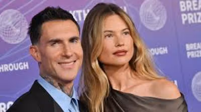 Adam Levine New Face baffles fans during rare outing with Behati Prinsloo