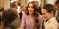 Kate Middleton says large royal settings are hard at Buckingham Palace reception