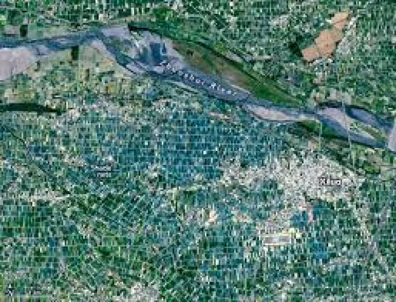 Landsat images show Taiwan’s Yunlin County, where farms pack tight