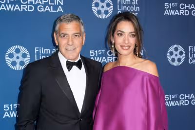 George Amal Clooney Chaplin Gala: Amal Clooney’s magenta Balenciaga turns heads
