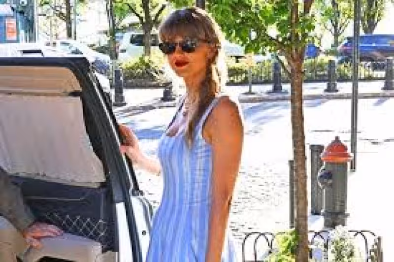 Taylor Swift Steps Out in $300 Dress and $9,750 Dior Bag in N.Y.C. with Dad Scott Swift
