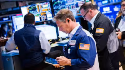 Fed Decision rattles stocks as rare four-way dissent jolts Wall Street