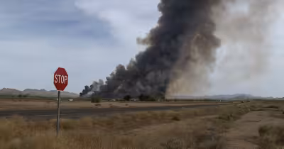 Buckeye Fire crews battle six-acre brush blaze in river bottom