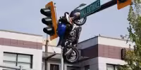 Motorcycle Hanging From Traffic Light After Delta Crash Injures Rider